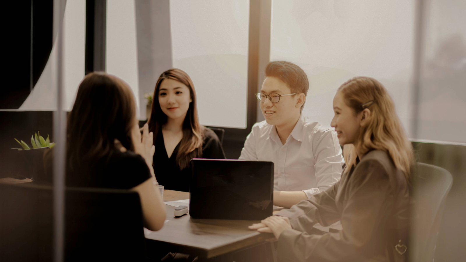 Group of people working in meeting room